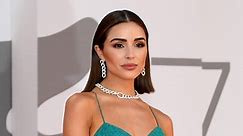 Olivia Culpo Shows How She Gets Ready in a Polka Dot Dress and White Mesh Heels