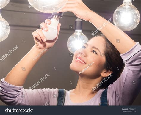390 Beautiful Woman Changing The Light Bulb Images, Stock Photos ...
