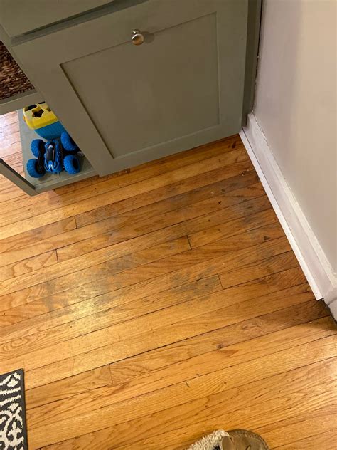 Is there anyway to improve the worn grey spots on my hardwood floor ...