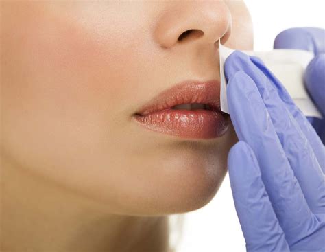 Your Guide to Waxing Your Upper Lip | InStyle