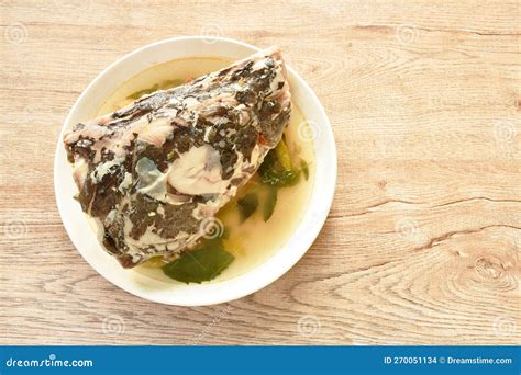 Boiled Asian Redtail Catfish Head with Chili and Lemon Dressings Celery ...