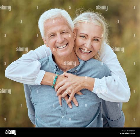 A happy mature caucasian couple enjoying fresh air on vacation at the ...