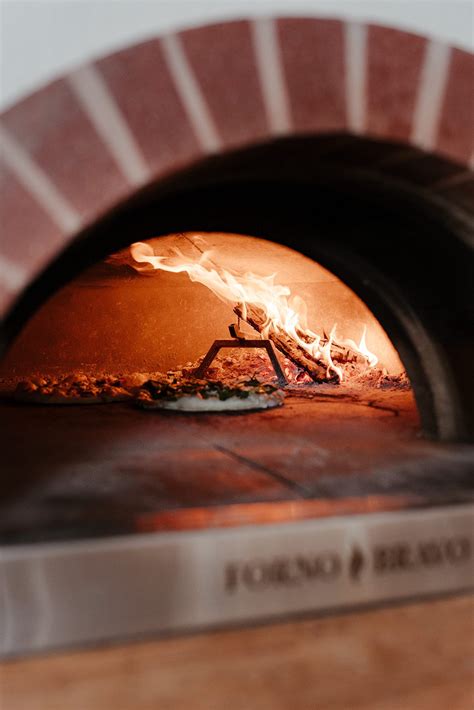 Wood Fired Pizza, Cocktails & Inspired Dishes | Hearth & Table