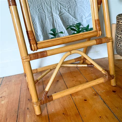 RATTAN FLOOR MIRROR