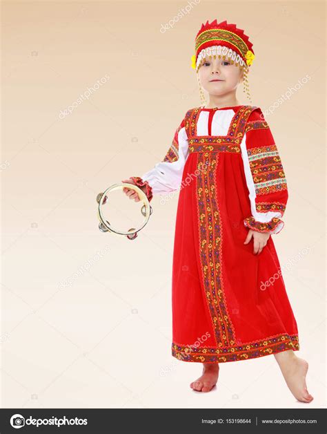 Girl in Russian national costume. — Stock Photo © lotosfoto1 #153198644