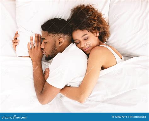 Loving Couple Sleeping in Bed and Hugging Stock Photo - Image of ...