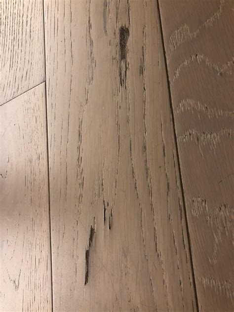 Moved in recently. Love the floor but there are loads of scratches ...