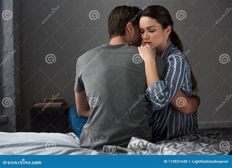 Romantic Couple Hugging on Bed Stock Photo - Image of interior ...
