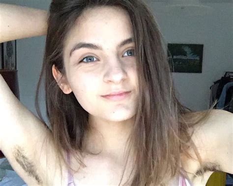 Download Hairy Woman Selfie Showing Off Armpits Wallpaper | Wallpapers.com