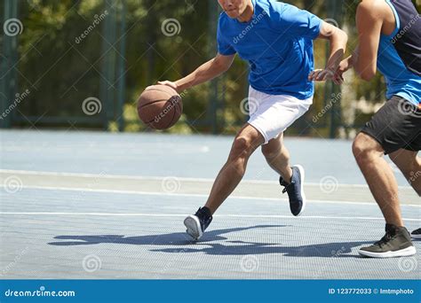 Young Asian Adults Playing Basketball Stock Image - Image of person ...