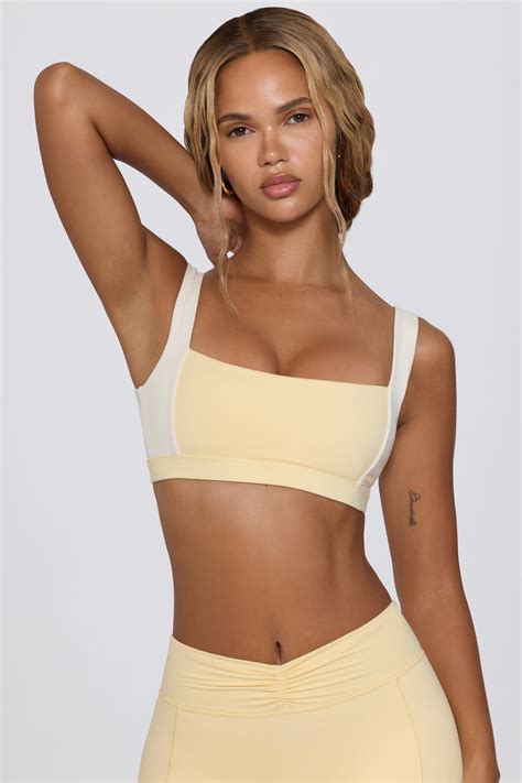 Contrast Sports Bra in Lemon Marl | Oh Polly