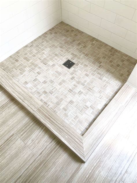 Expanding the Look of a Small Bathroom with a Tiled Shower Curb