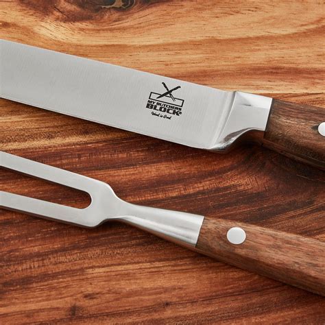 Close-up of Carving Knife and Fork with wooden handles