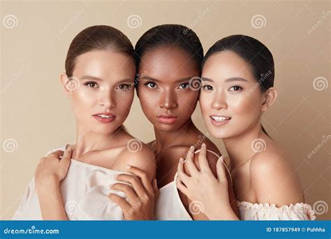 Women. Diversity Models Beauty Portrait. Two Ethnic Female With Nude Makeup And Smooth Hydrated ...