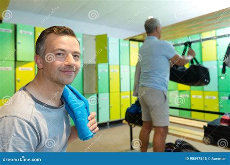 Mature man in locker room stock image. Image of open - 95597545