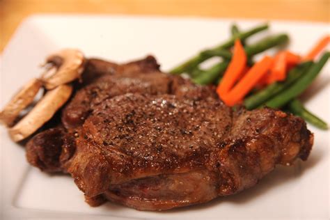 The Delmonico or ribeye steak cut is rich with fat marbling, making it ...