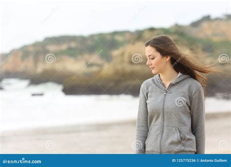 Melancholic Teen Walking on the Beach Alone Stock Photo - Image of ...