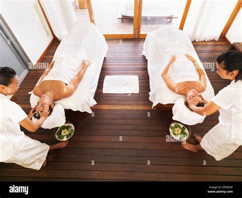 Four massaging hi-res stock photography and images - Alamy