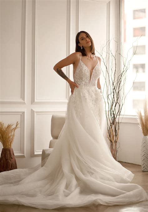 Sexy Sparkling Fit-and-Flare Wedding Dress with Low Open Back Detail