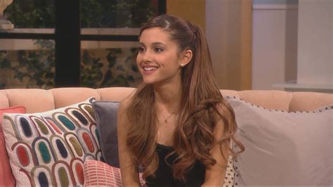 Download Ariana Grande posing for a photo with a wholesome smile ...