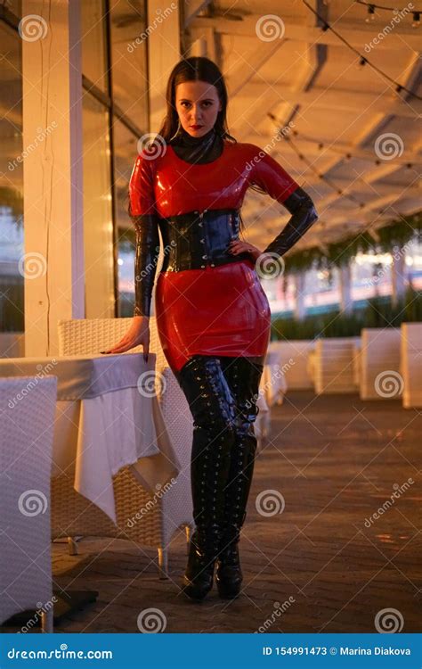 Brave Girl in Latex Walks in Public and Shows Her Exhibitionism Stock ...