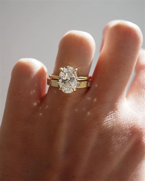 Kate & Kole on Instagram: "The perfect pairing — Our Clara 3.09ct Oval ...