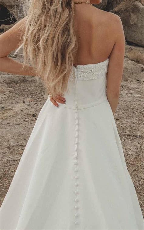 Simple Strapless Wedding Gown with Pockets | Stella York Wedding Dresses