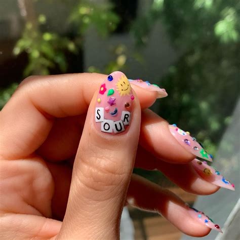 Bana on Instagram: “SOUR inspired nail art courtesy of @oliviarodrigo’s ...