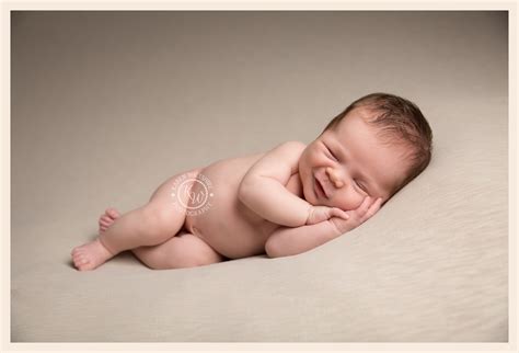 Sleeping Newborn Baby Smiling
