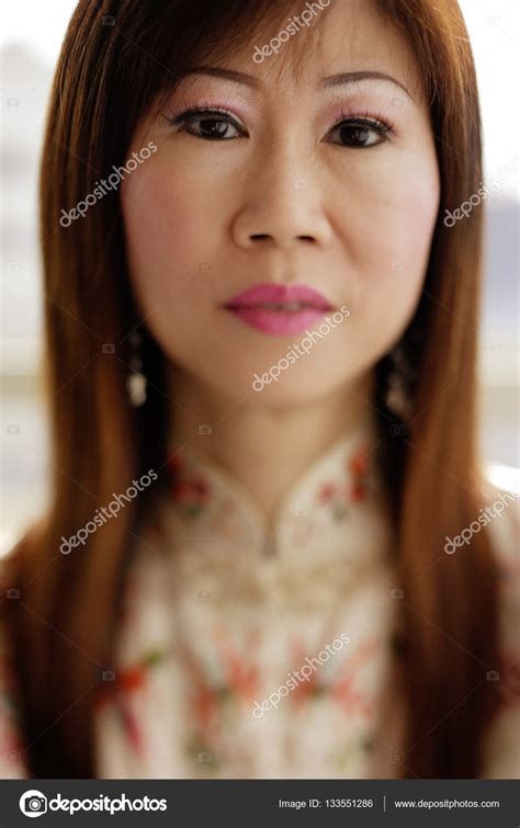 Asian mature woman Stock Photo by ©MicrostockAsia 133551286