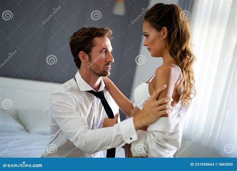 Romantic Couple Being Intimate and Sensual in Bedroom Stock Image ...