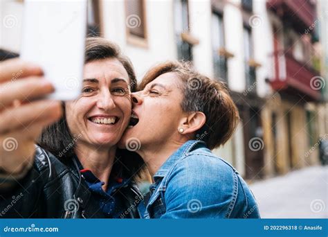 Happy Middle Aged Lesbian Couple Taking a Funny Selfie Stock Photo - Image of lesbian, candid ...
