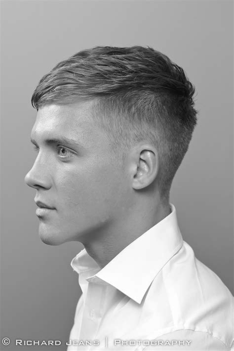 High short back & sides with neat side-brushed top and clean shaven ...