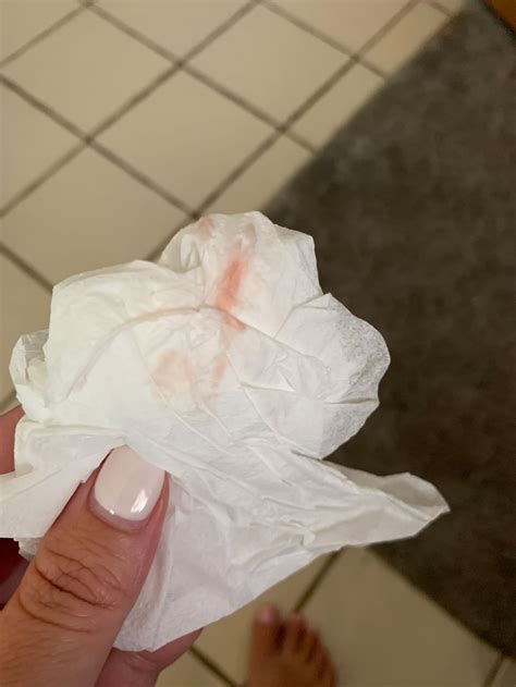 Pinkish Blood On Toilet Paper