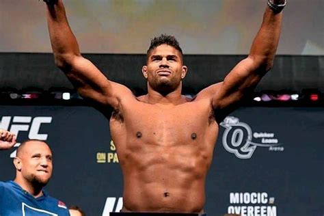 Download Alistair Overeem With Arms Up Wallpaper | Wallpapers.com