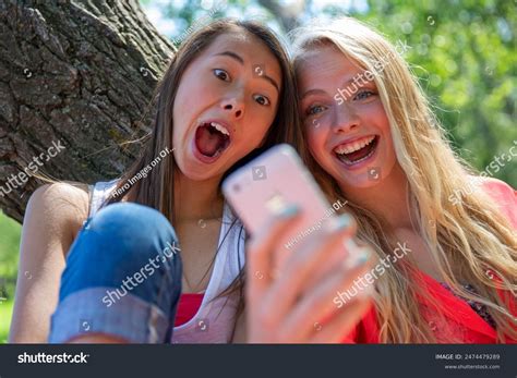 Playful Teenage Girls Taking Selfie Park Stock Photo 2474479289 ...