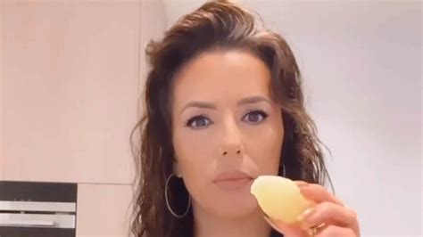 Eva Longoria, 48, shows off her incredible figure in unbuttoned top as she indulges in ripe ...