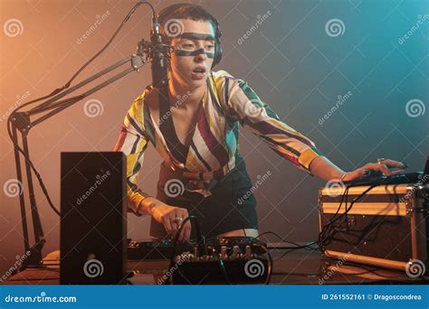 Disc Jockey Mixing Techno Music with Turntables Stock Image - Image of ...