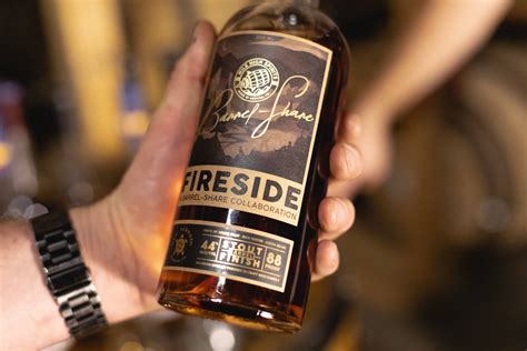 Download Mile High Spirits Barrel-share In Hand Wallpaper | Wallpapers.com