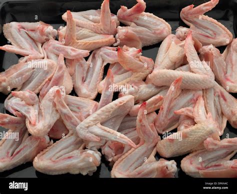 Raw uncooked chicken wings hi-res stock photography and images - Alamy