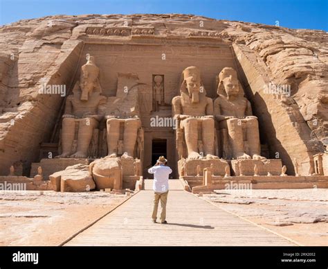 The Great Temple of Abu Simbel with its four iconic 20 meter tall seated colossal statues of ...