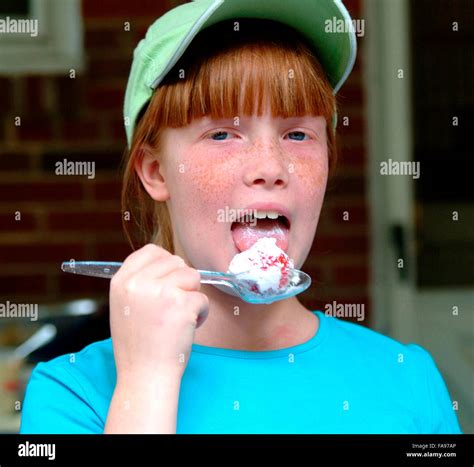 Teen girl eats hi-res stock photography and images - Alamy