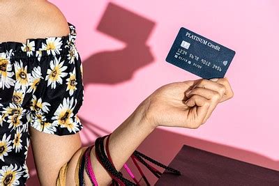 Woman holding credit card and | Premium Photo - rawpixel