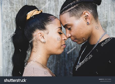 African American Lesbian Couple Touching Foreheads Stock Photo ...