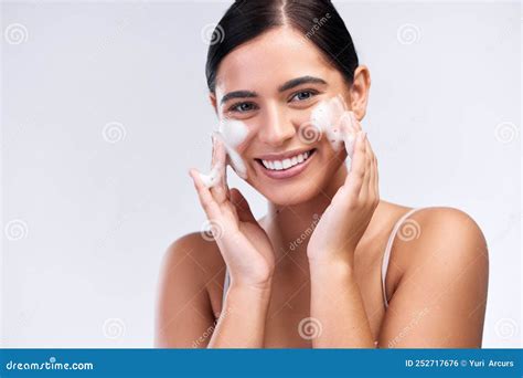 Proper Skin Care Means Cleansing it Properly. Studio Shot of a ...