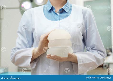 Doctor Holding Silicone Implants for Breast Augmentation in Clinic. Cosmetic Surgery Stock Photo ...