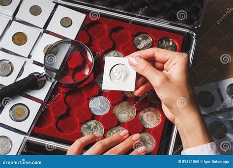Box with Collectible Coins and Magnifying Glass Stock Photo - Image of ...