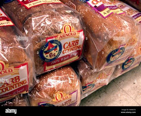 A display of Arnold Carb Counting whole wheat bread on a supermarket ...