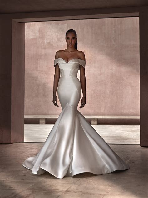 Mikado wedding dress Avonia with off shoulder style | Pronovias