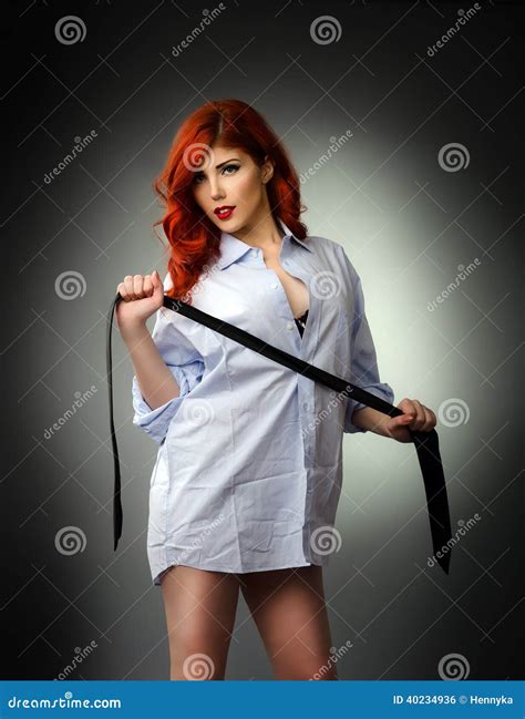 Woman Holding a Men`s Tie Ready for Spanking Stock Photo - Image of beauty, debauchery: 40234936